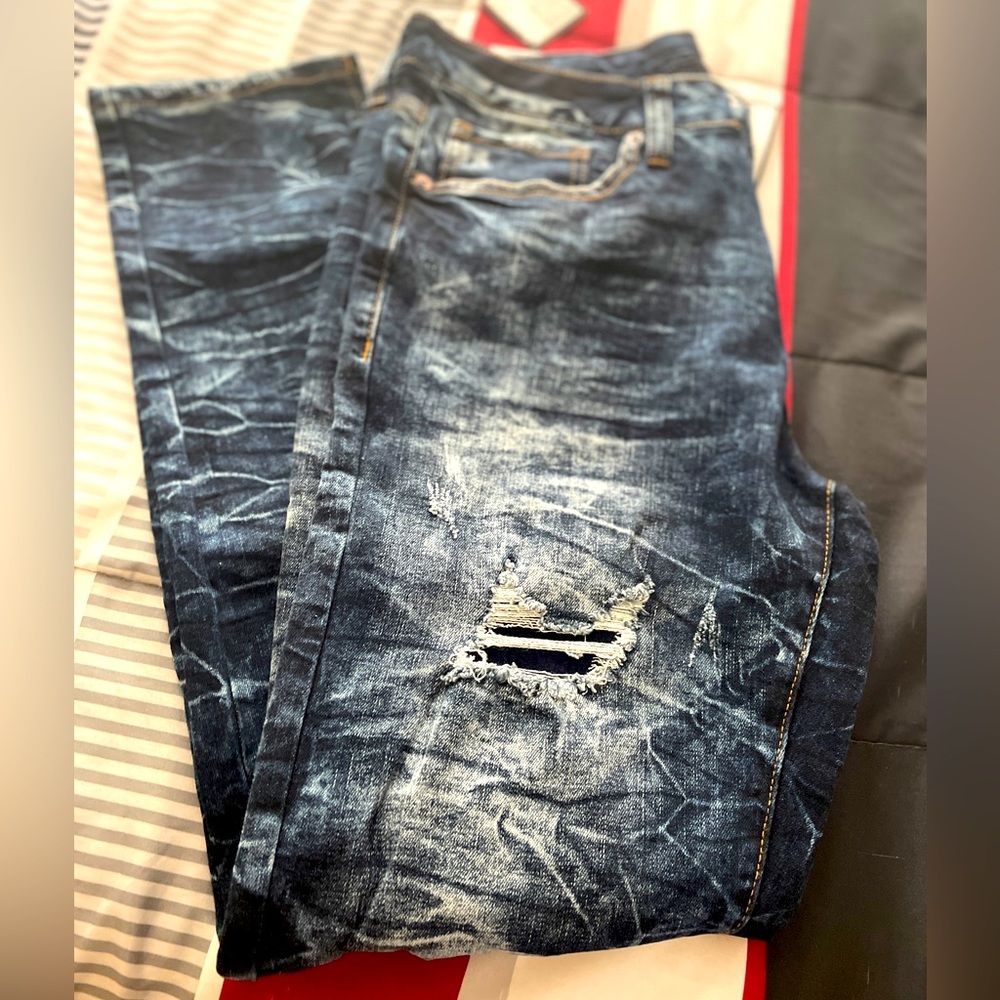 Men’s bleached and distressed skinny jeans.